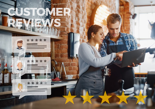 Business owners reviewing the reviews they are getting online