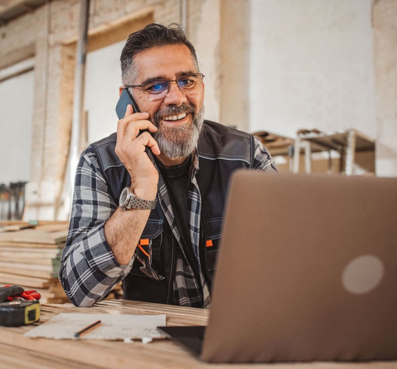 Business owner on the phone with a customer