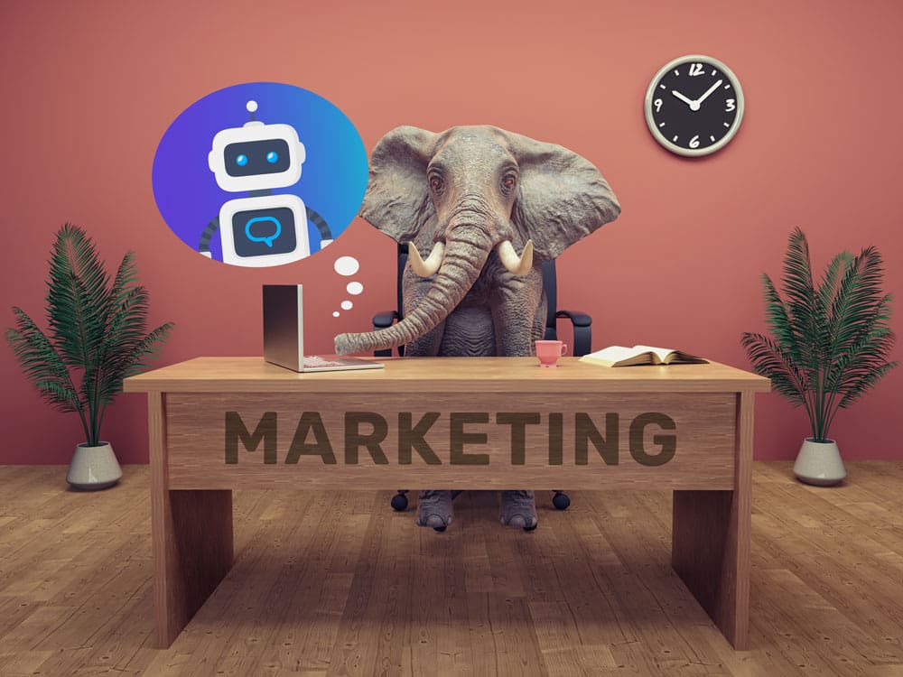 An AI image of an elephant sitting at a desk with a AI robot in a thought bubble.